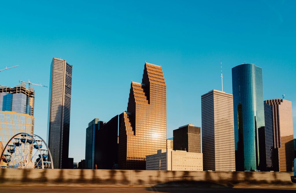 A skyline of Houston apartments that require affordable cleaning services.