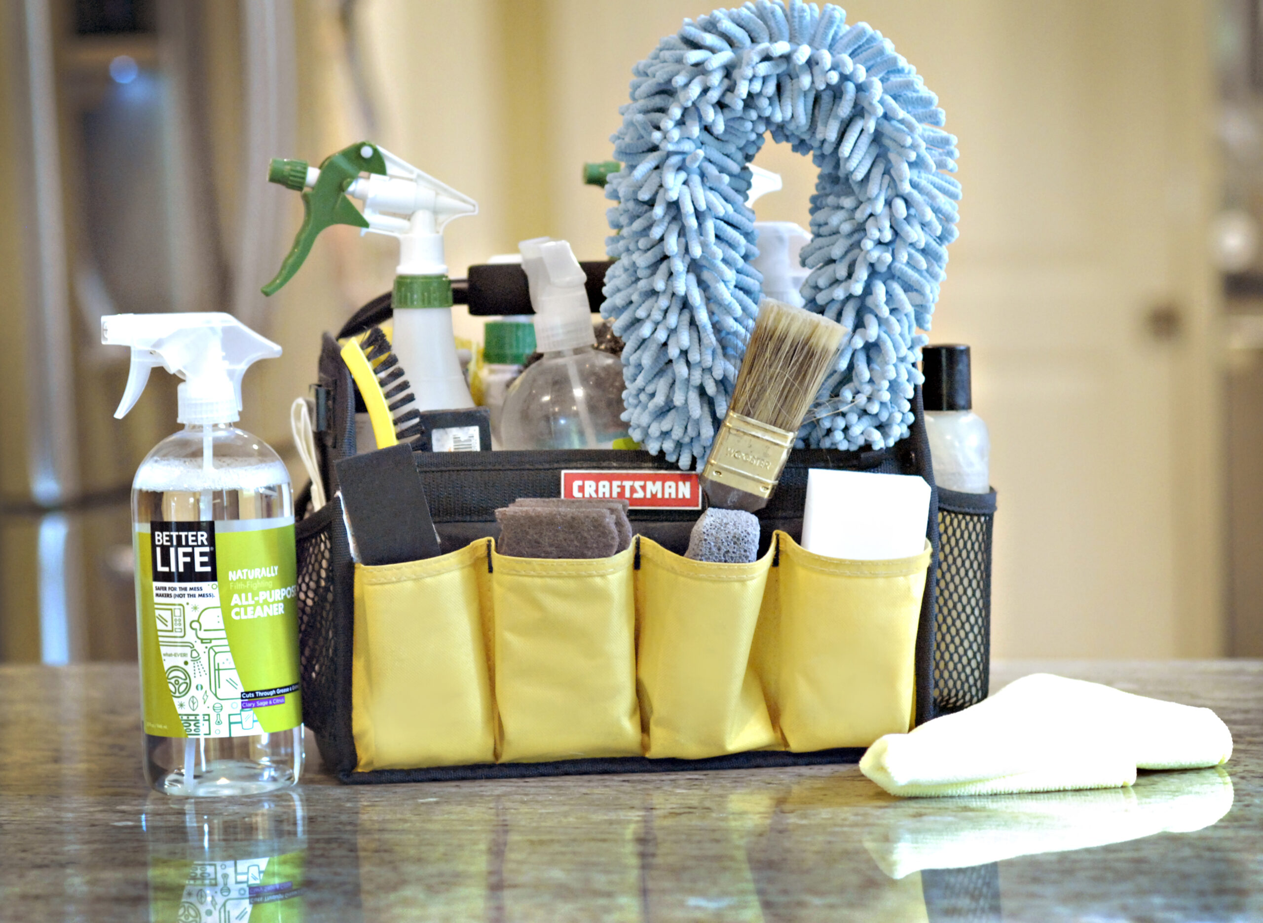 Naturalcare Clraning Service green cleaning products that may be more reliable than mopping with cinnamon are displayed on a kitchen counter.