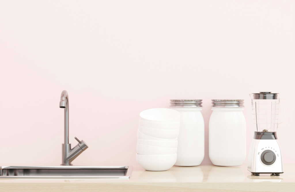 A clean kitchen is ready for dinner to be prepped with jars of ingredients on the counter, thanks to the apartment cleaning checklist.