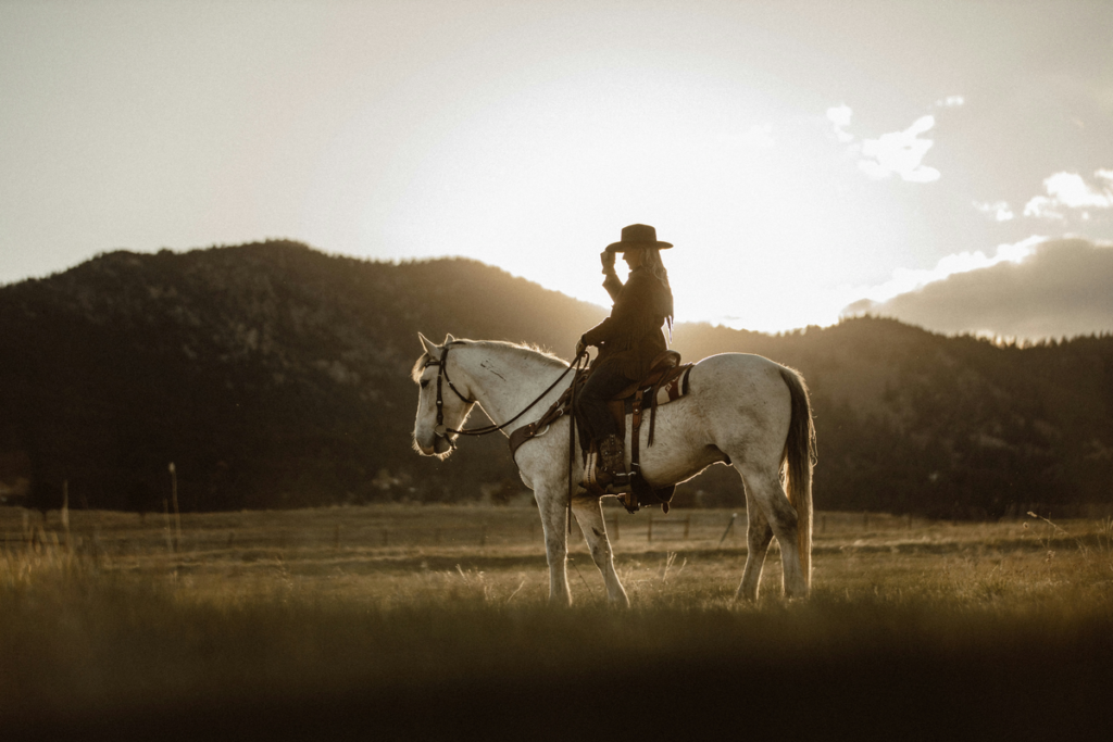 A woman riding a horse near Cinco Ranch.